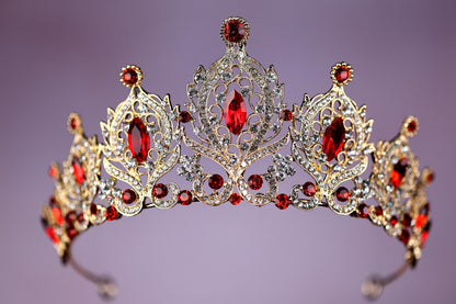 a tiara with a lot of red stones on it
