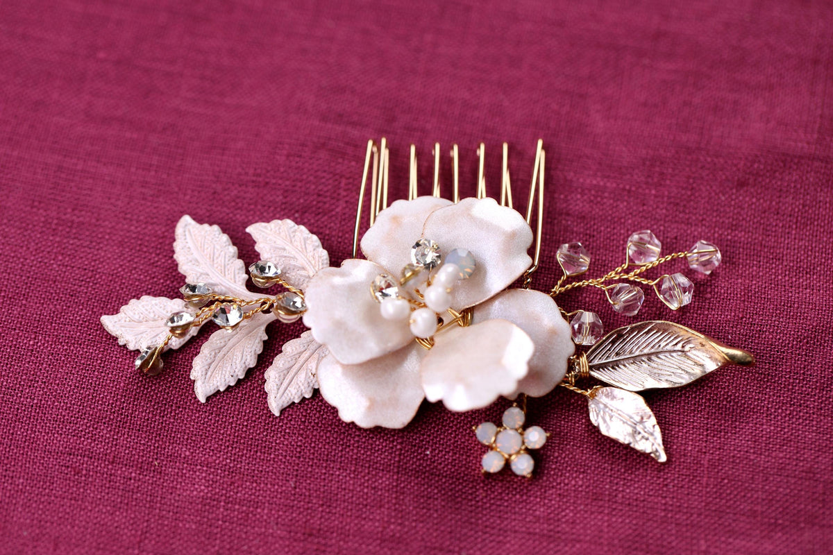 a close up of a hair comb with flowers on it