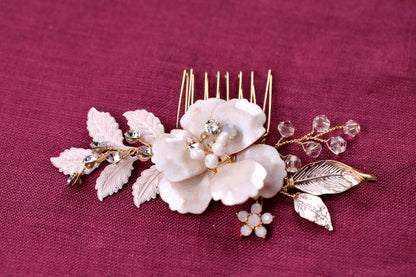 a close up of a hair comb with flowers on it