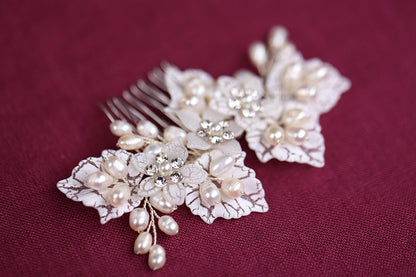 a close up of a hair comb with flowers on it