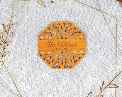 a wooden plaque with a name on it
