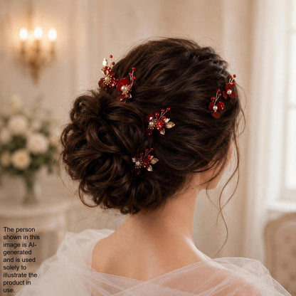 a woman's back view with her hair styled in an updo, adorned with red and gold hair clips.