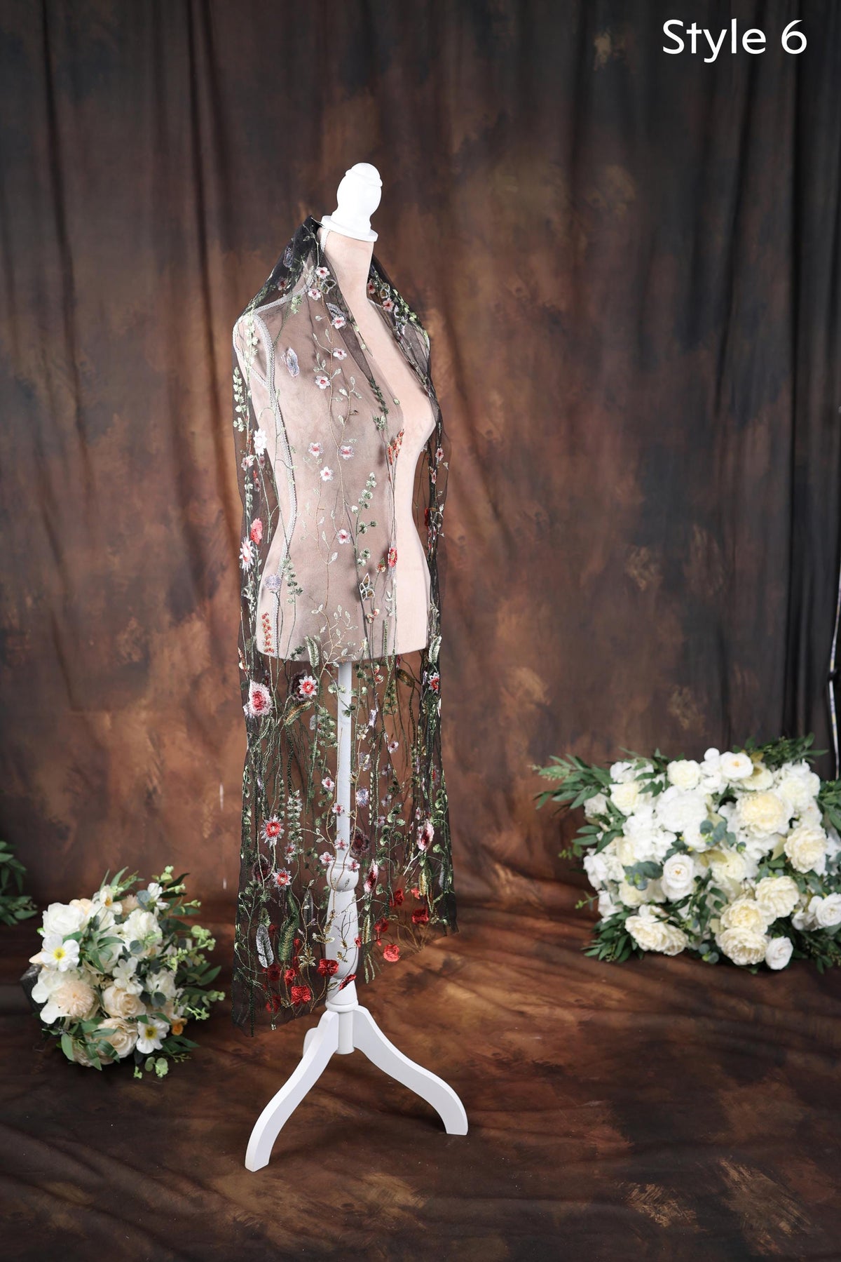 a mannequin with a dress on a stand