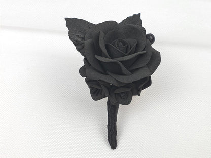 a single black rose on a white background