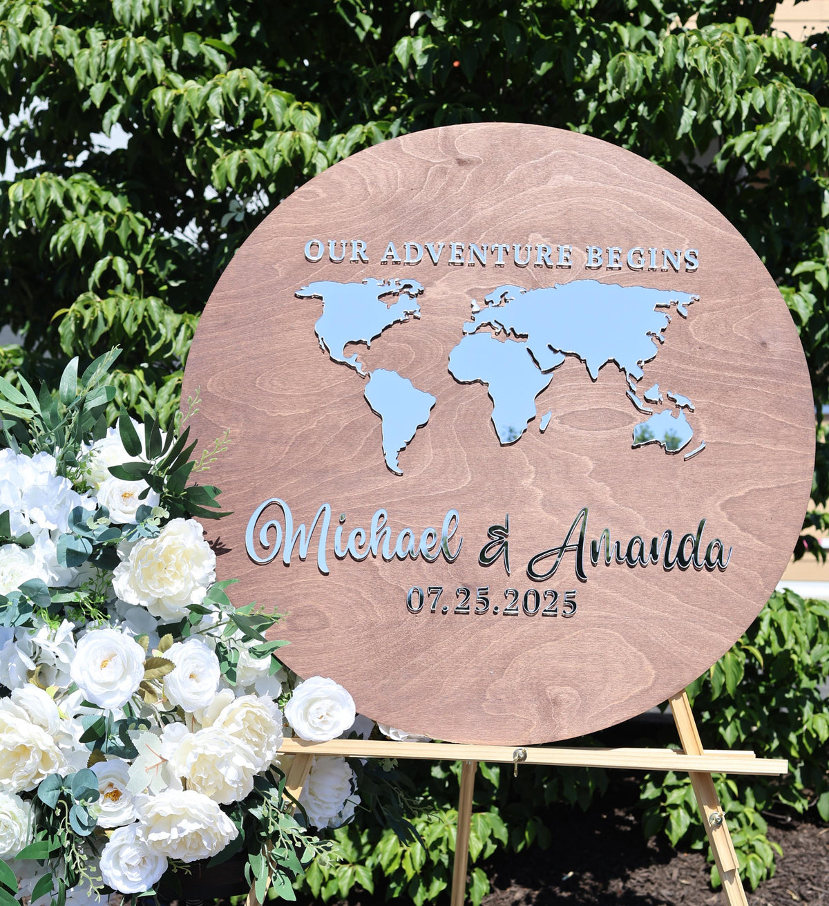 a wooden sign with a map of the world on it