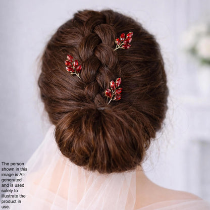a woman's back view with her hair styled in a bun, adorned with red flower hair clips.