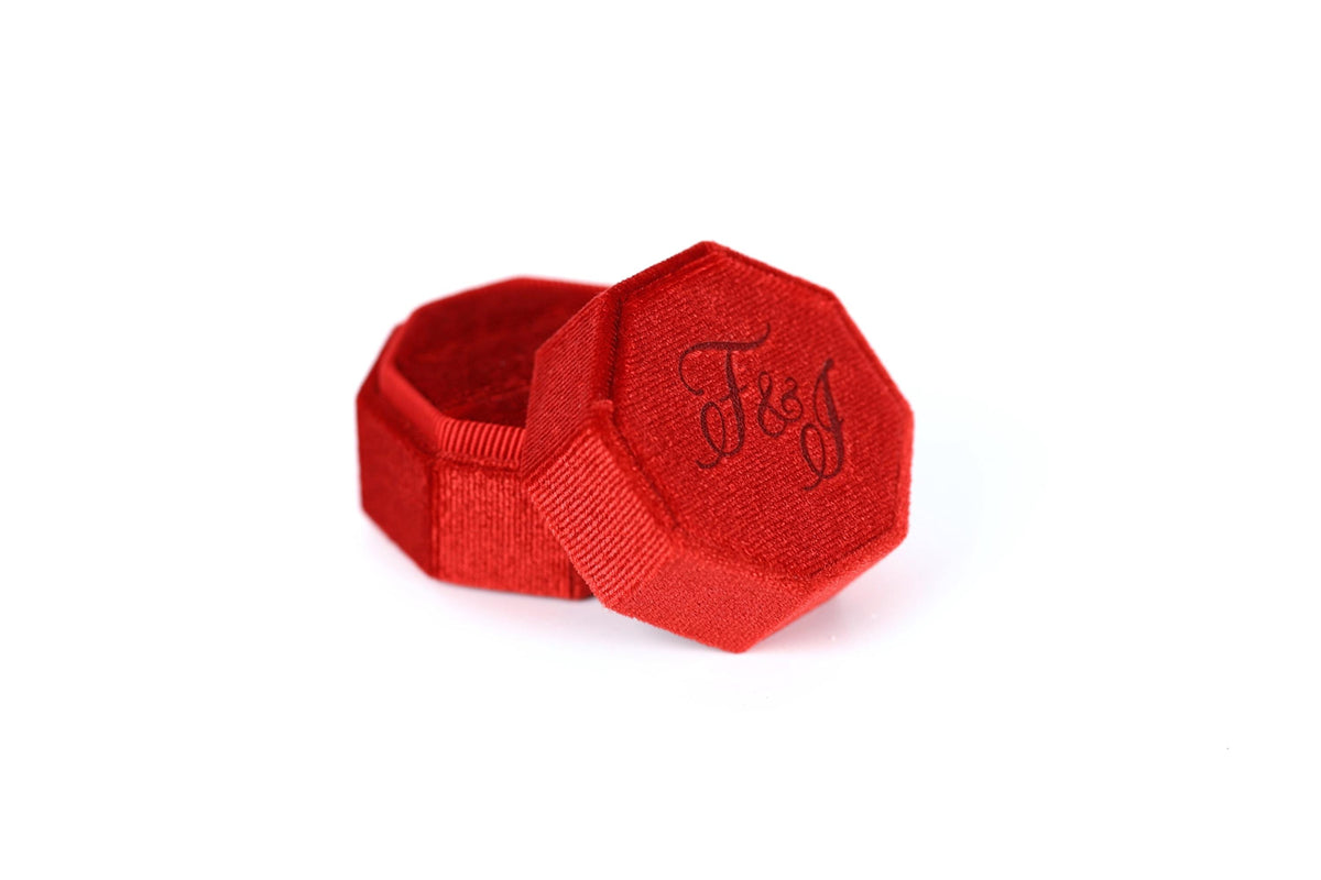 A red, octagonal box with the word "F&J" embossed on it.