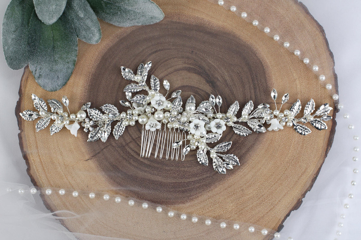 a bridal hair comb with pearls and leaves