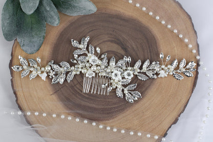 a bridal hair comb with pearls and leaves